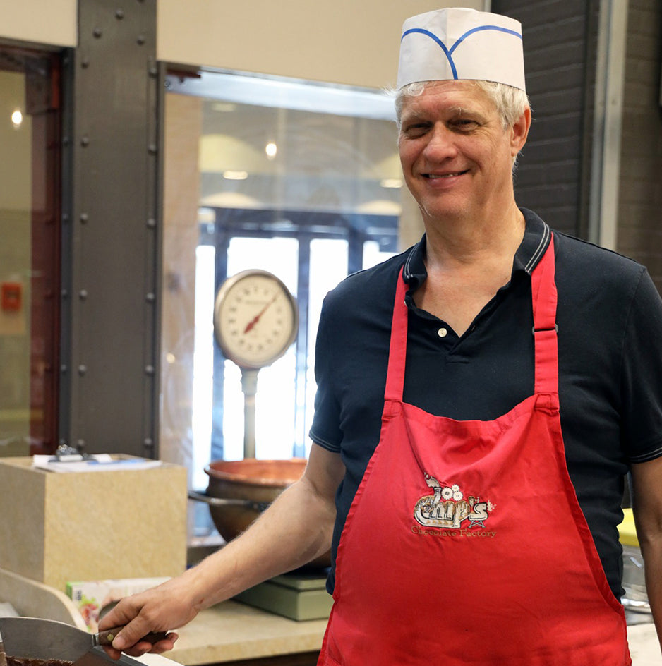 Cliff the chocolate confectioner wearing Chip's Chocolate Factory apron